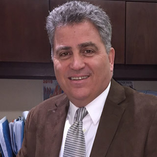 Michael Butigian - President, COO